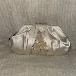 Badgley Mischka Elegant Off White Satin Clutch with Floral Embellishments
